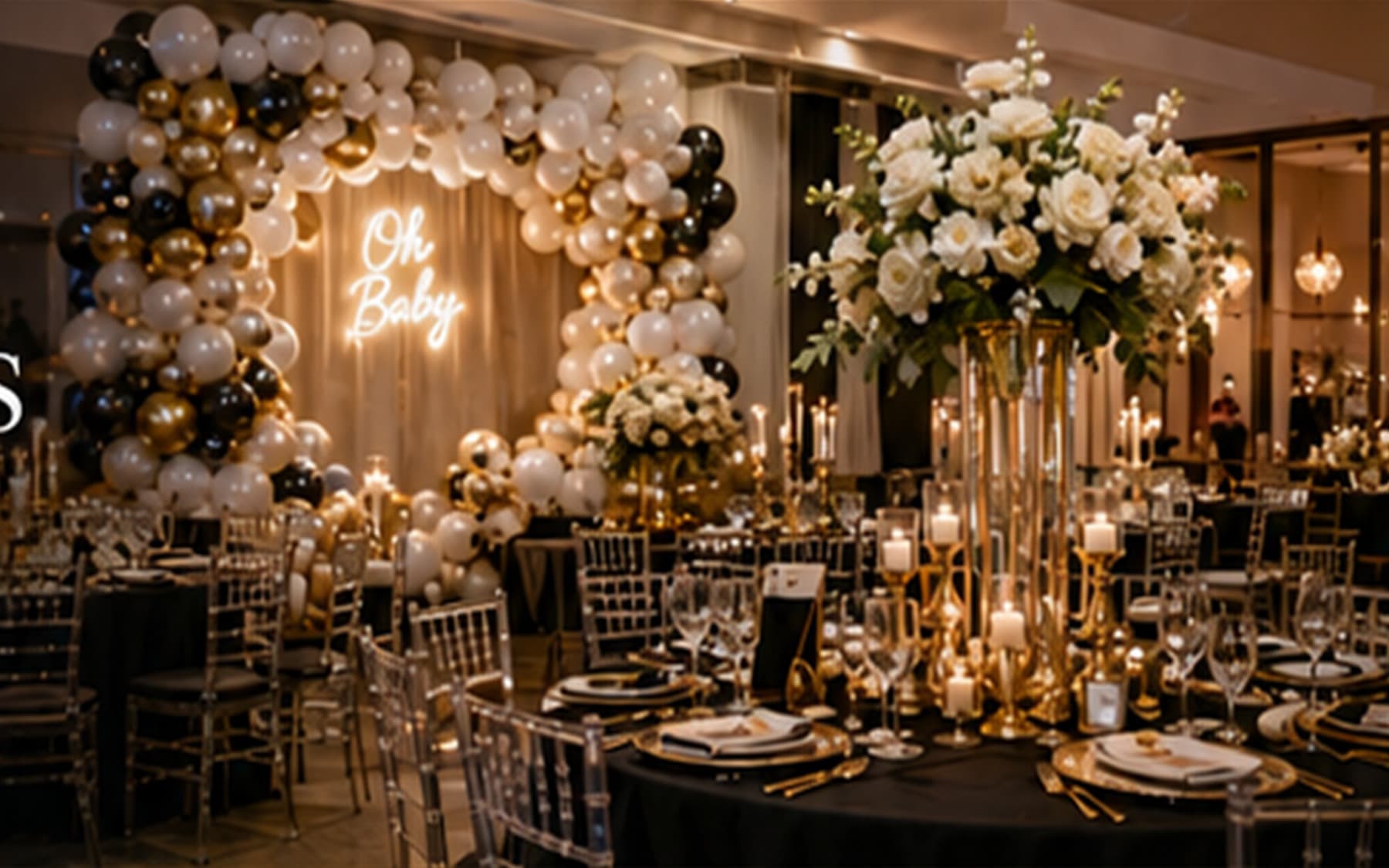 Luxury black and gold event setup with balloons, flowers, candles, dessert table, and elegant party details.