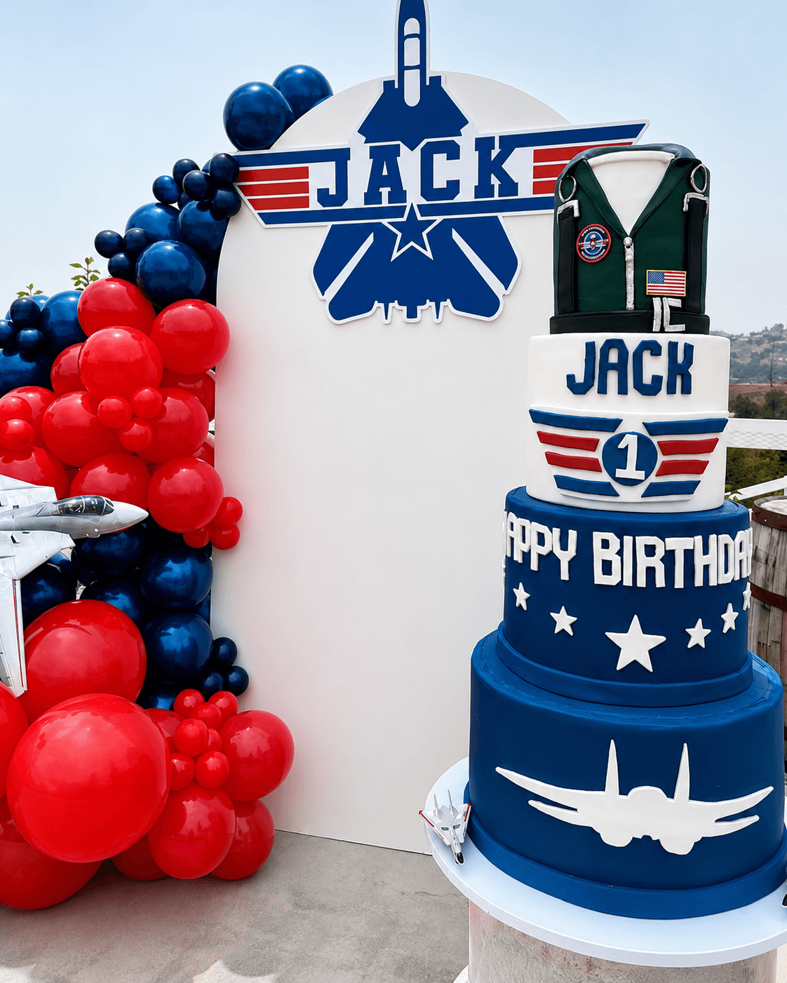 Jack aviation party cake and balloon setup by Lovelle Patisserie